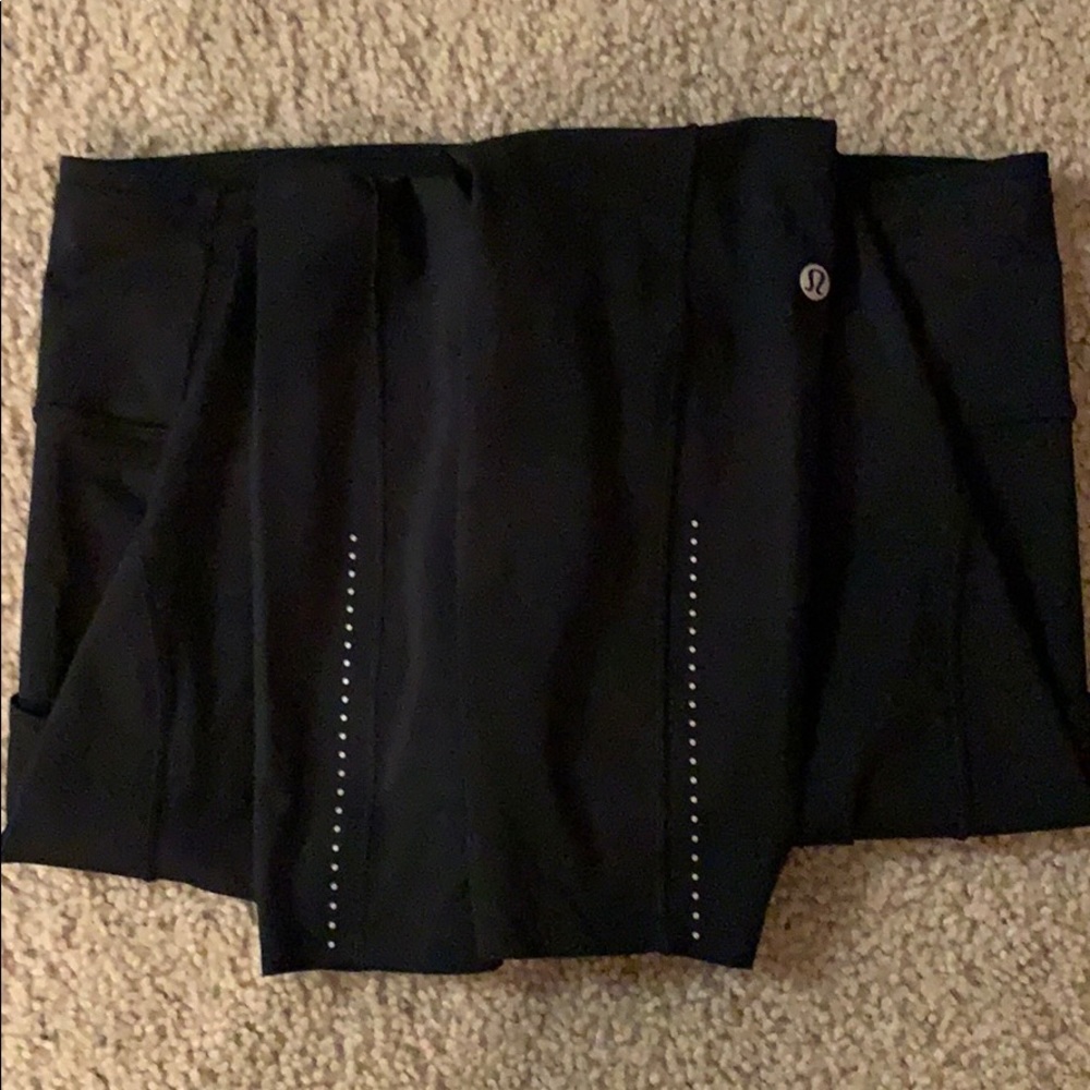 Black running or yoga pants. Like new with no tags